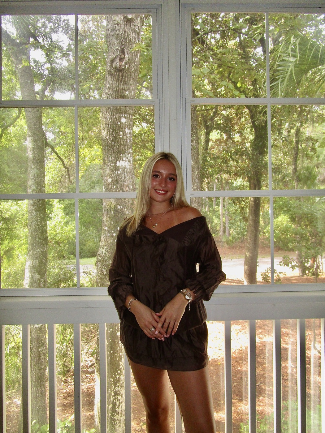 Model wearing the Peppermayo Brown Ruffle Mini Dress