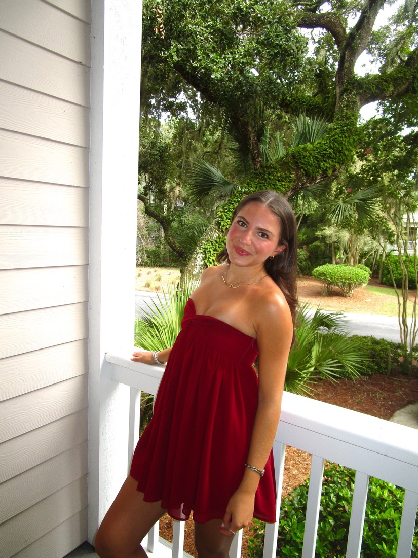 Model wearing the Peppermayo Garnet Scarf Mini Dress